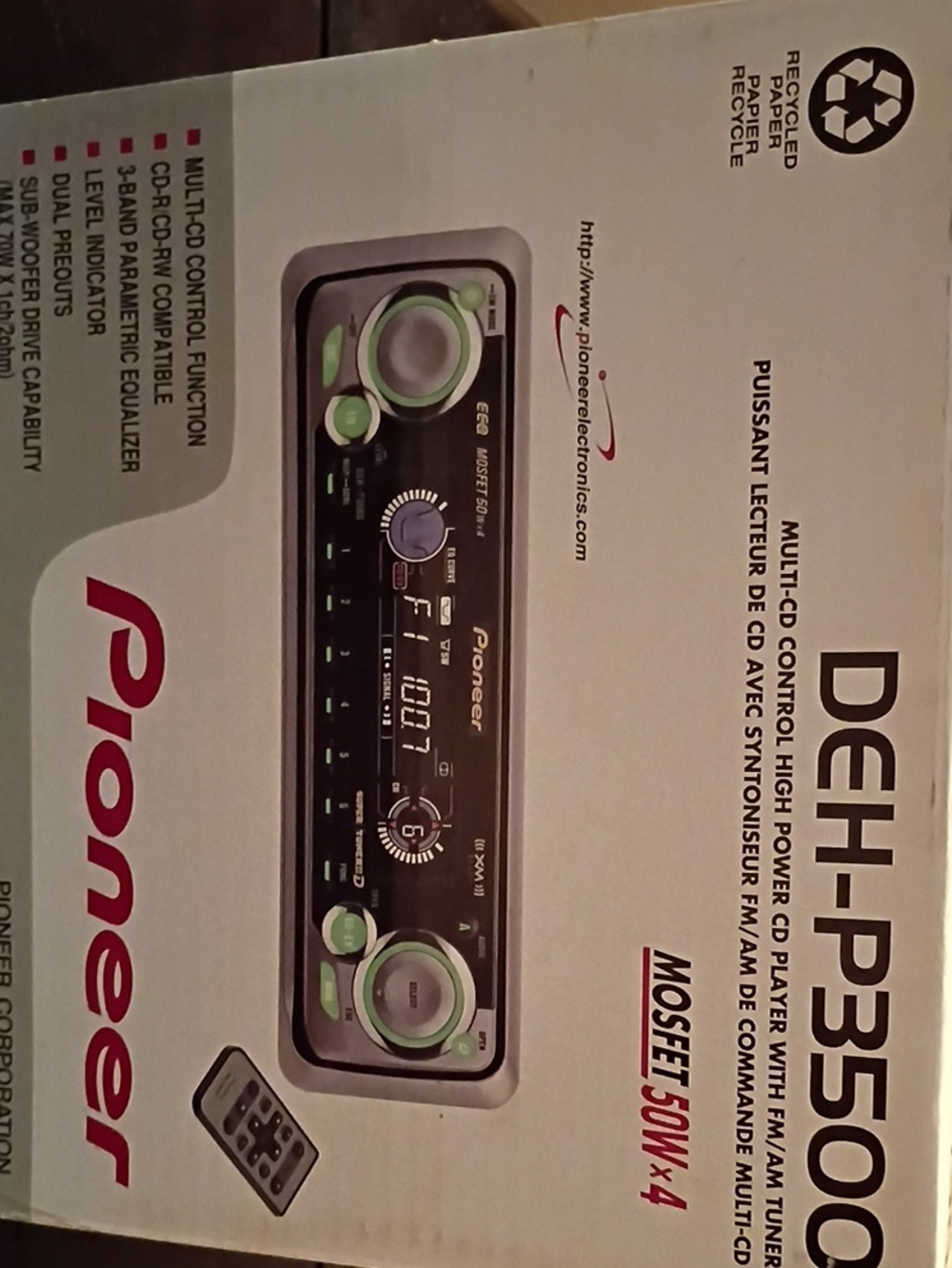 PIONEER car stereo receiver in black with green accents